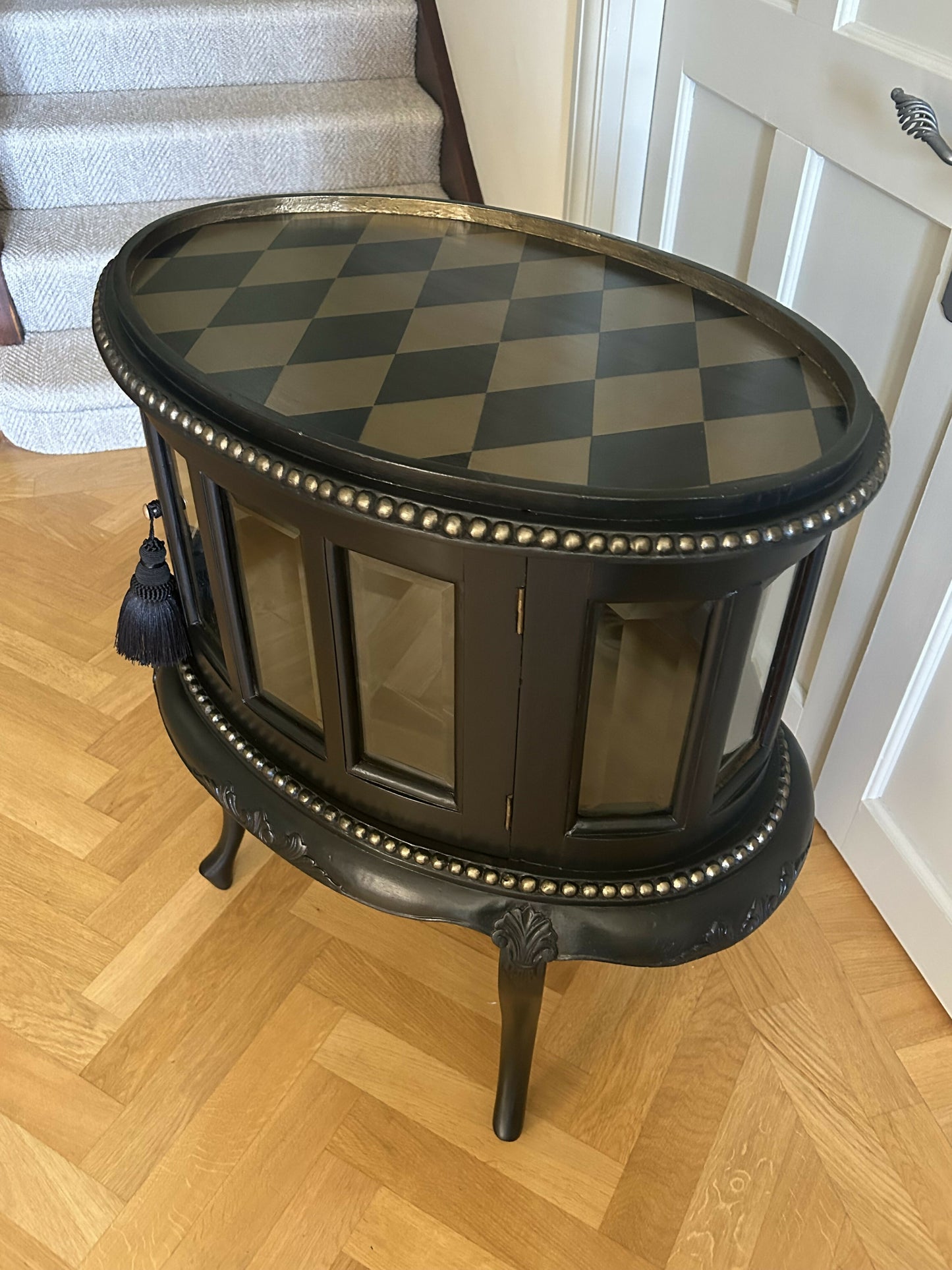 Drinks Cabinet. Handpainted, small oval glazed cabinet. Black/Gold