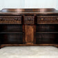 A NIGEL RUPERT GRIFFITHS MONASTIC CARVED OAK DRESSER BASE / SIDEBOARD / CABINET / CUPBOARD.