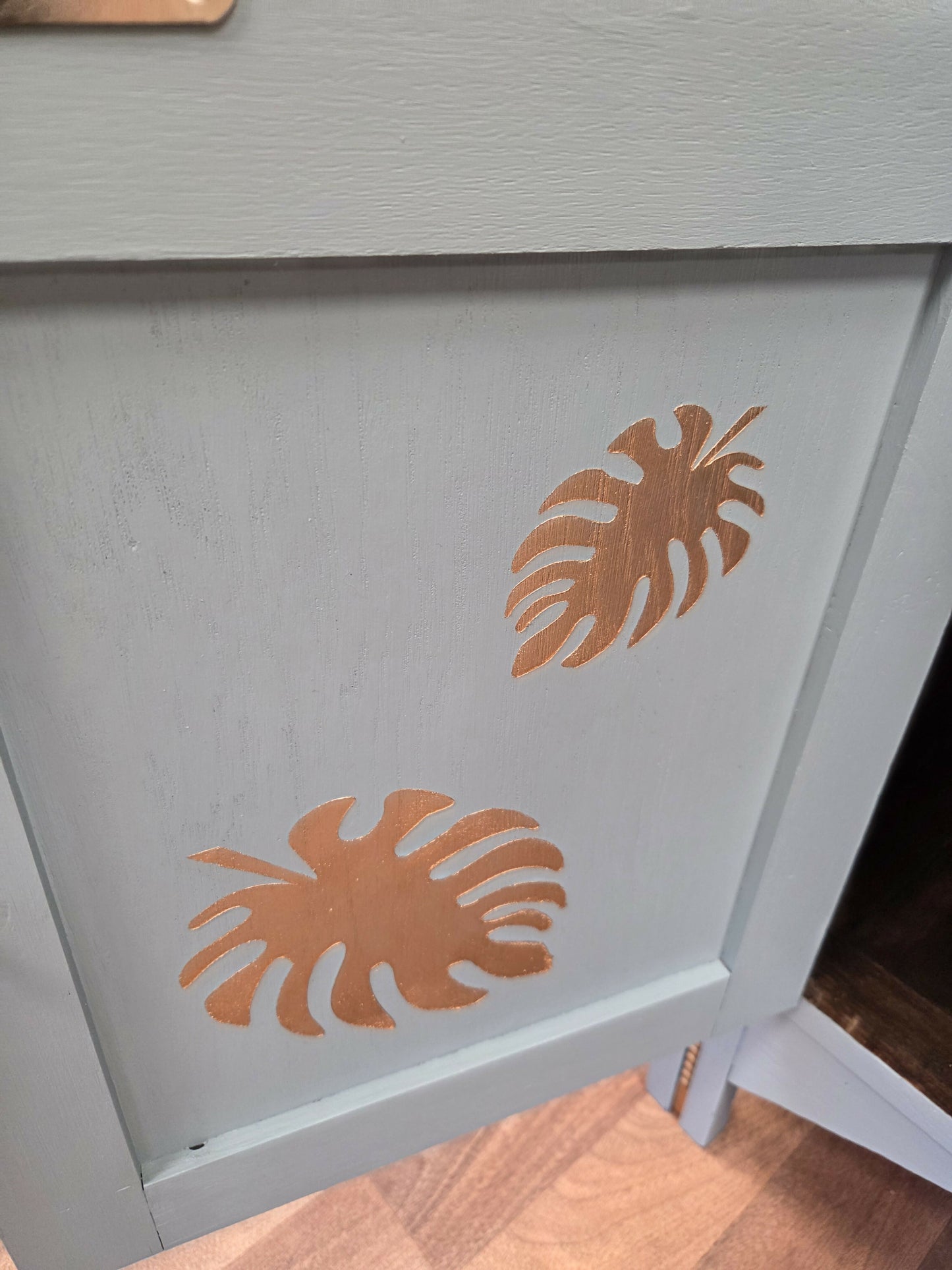 Vintage pale blue and gold drawered cupboard.