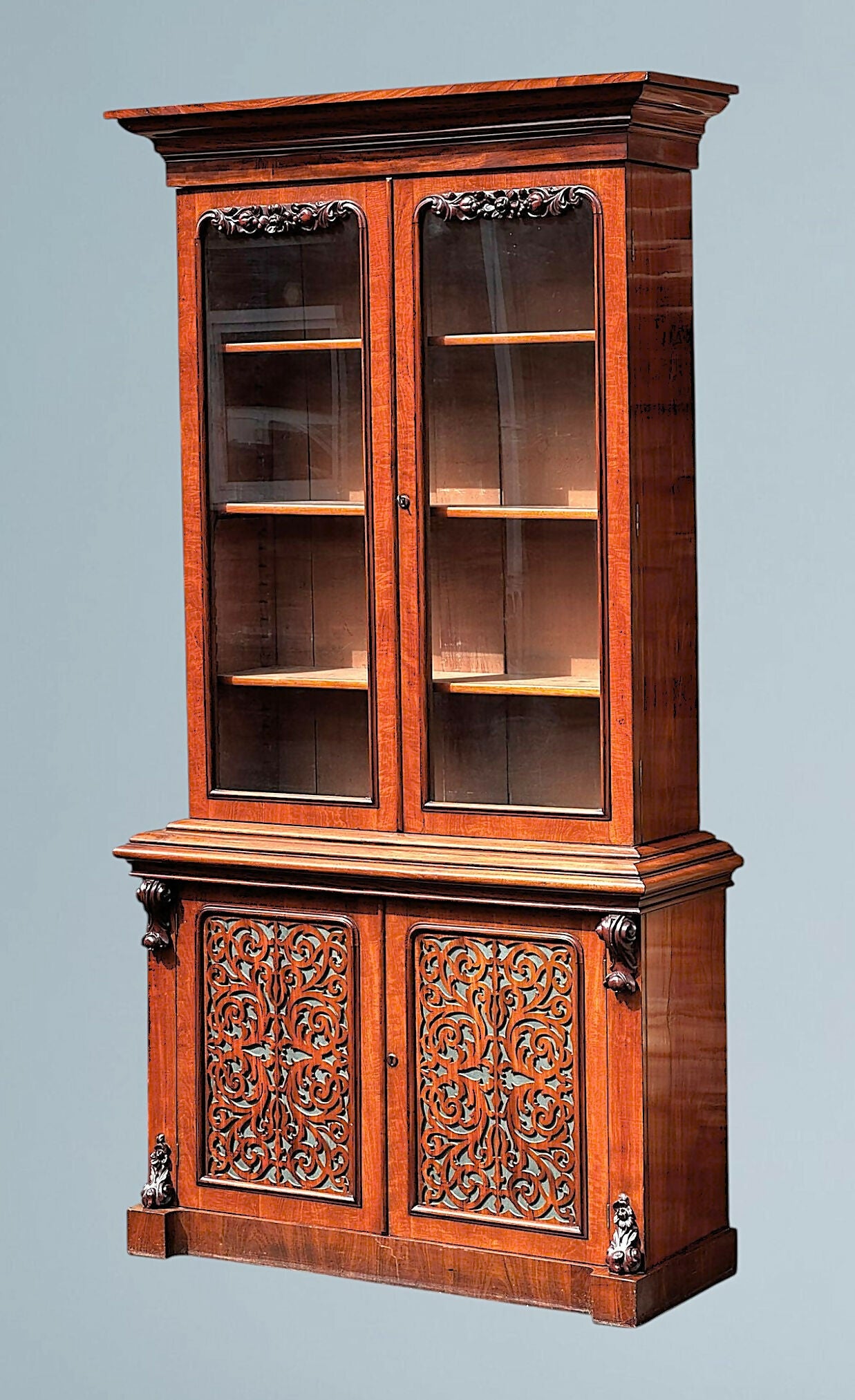 A Large Impressive Victorian Figured Mahogany Bookcase