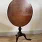 An Antique Oak Tripod Table