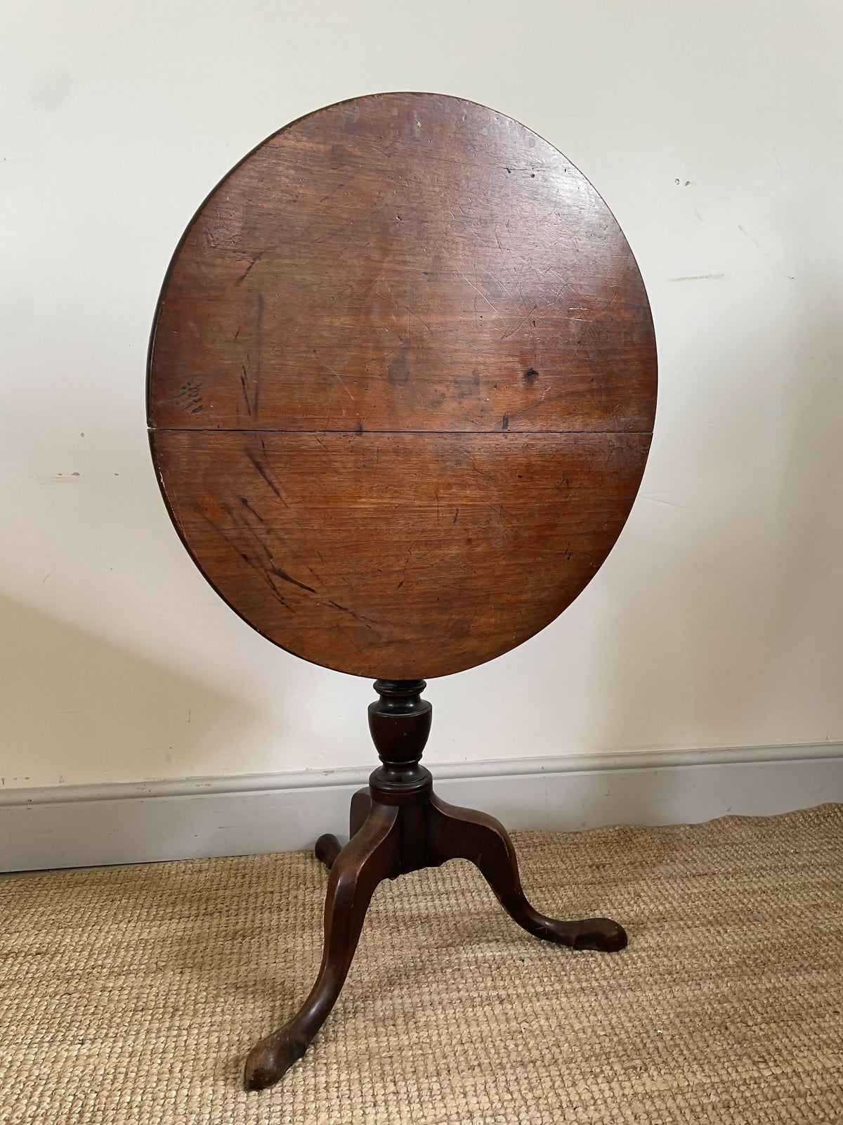 An Antique Oak Tripod Table