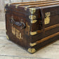 Antique full leather and brass bound travel trunk coffee table
