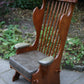 A RUPERT / NIGEL GRIFFITHS CARVED OAK DERBYSHIRE WING BACK LEATHER / ARMCHAIR