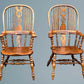 A Large Pair of Ash Broad Arm Windsor Chairs