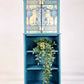 Teal Cabinet With Decorative Front