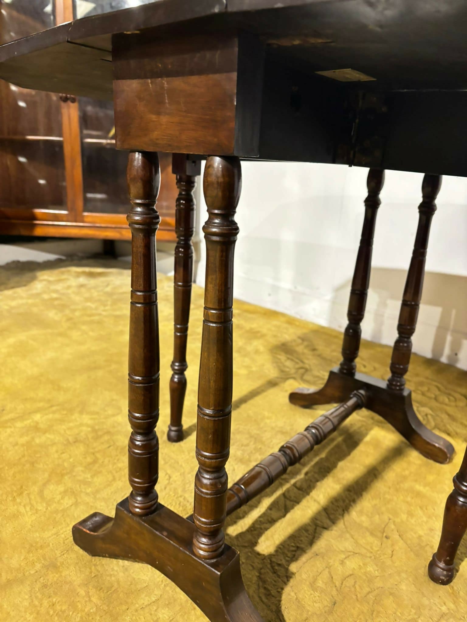 Edwardian mahogany table of small proportions resting on turned legs.0