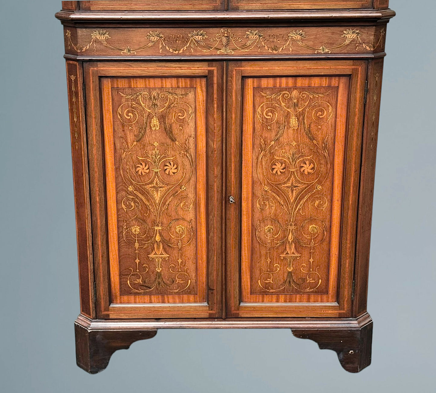 An Edwardian Mahogany, Satinwood and Marquetry Inlaid Corner Cabinet