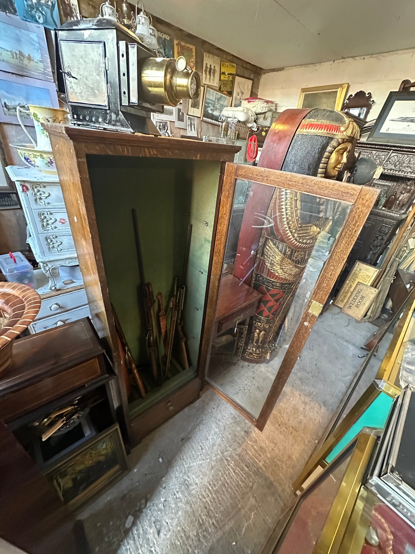 Tall Antique Gun Display Cabinet