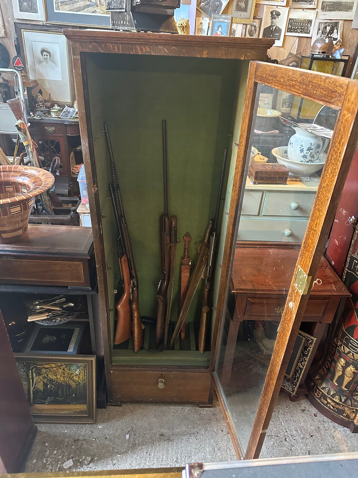 Tall Antique Gun Display Cabinet