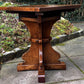 A RUPERT GRIFFITHS MONASTIC CARVED SOLID OAK LAMP TABLE / PLANT STAND