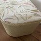 Gold painted mid century Ottoman with new marching cotton fabric top