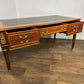 Continental Reproduction Walnut Veneered Tooled Inlaid Desk (style of Louis XVI)