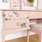 Dusky blush pink Stag Minstrel dressing table set with blossom and butterfly design.