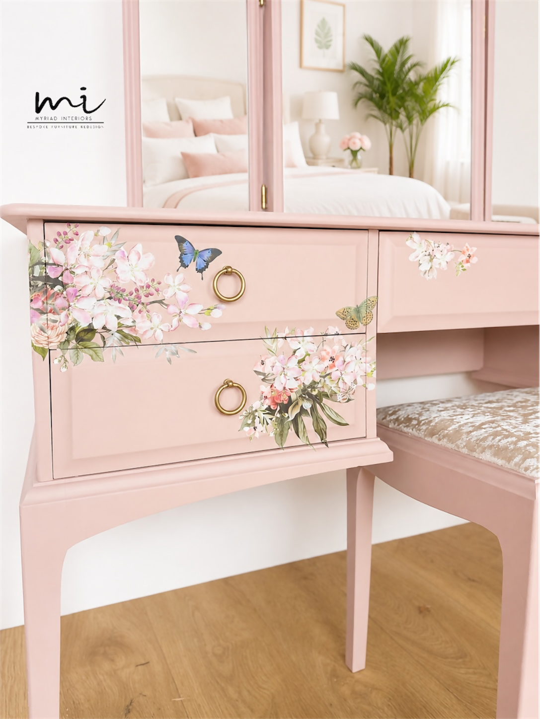 Dusky blush pink Stag Minstrel dressing table set with blossom and butterfly design.
