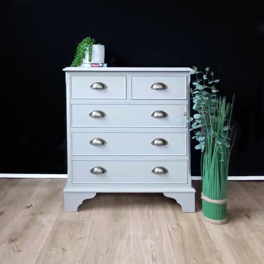 Elegant 5 Drawer chest in a beautiful neutral tone.