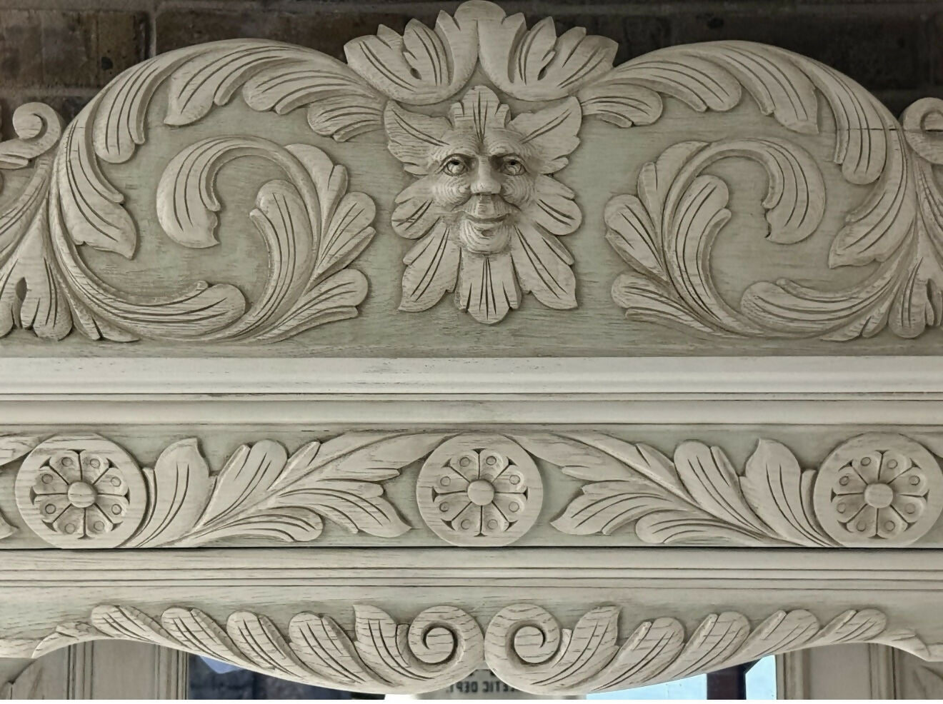 Victorian Dresser with ornate green man carvings.