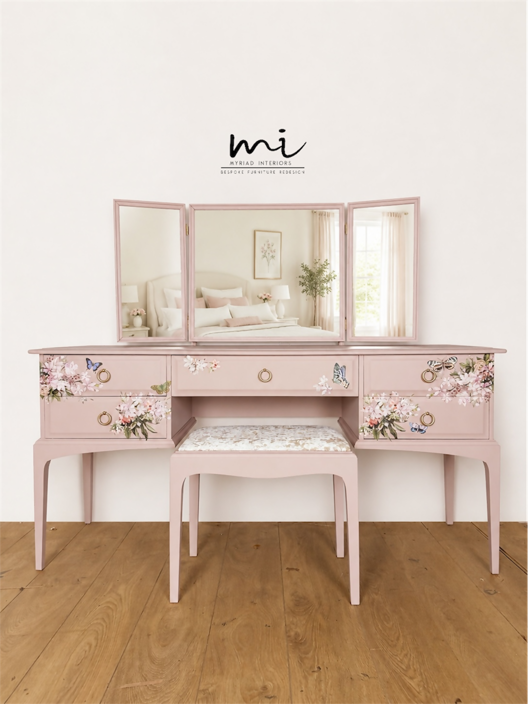 Dusky blush pink Stag Minstrel dressing table set with blossom and butterfly design.