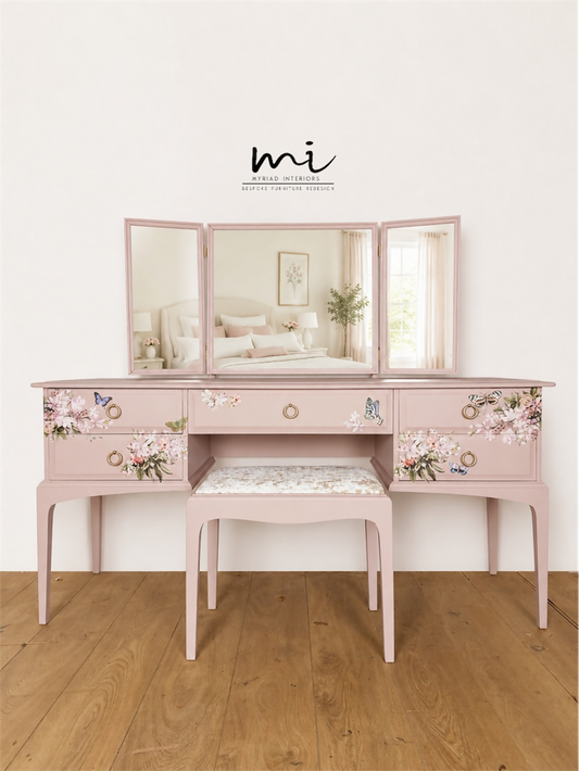 Dusky blush pink Stag Minstrel dressing table set with blossom and butterfly design.
