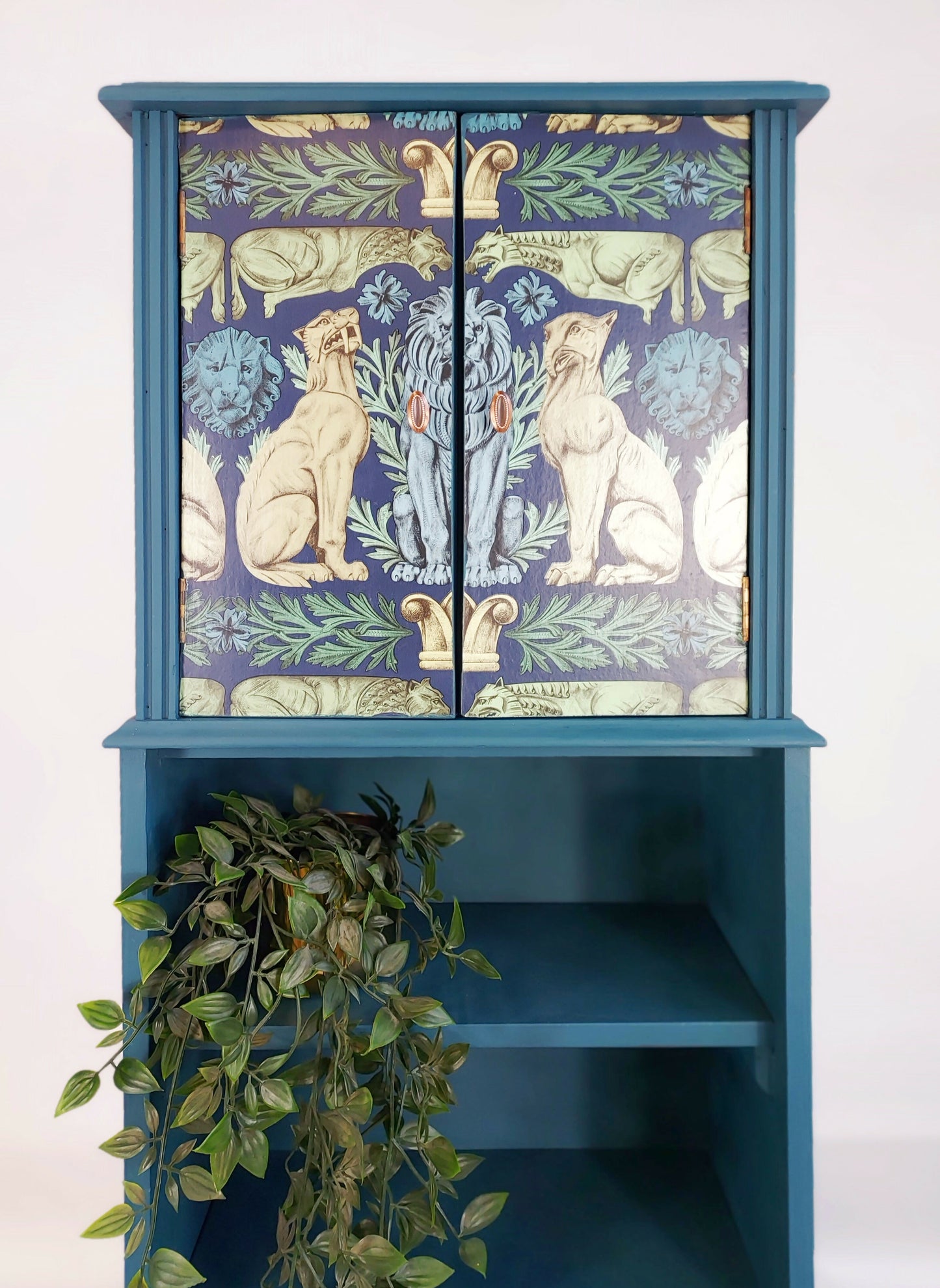Teal Cabinet With Decorative Front
