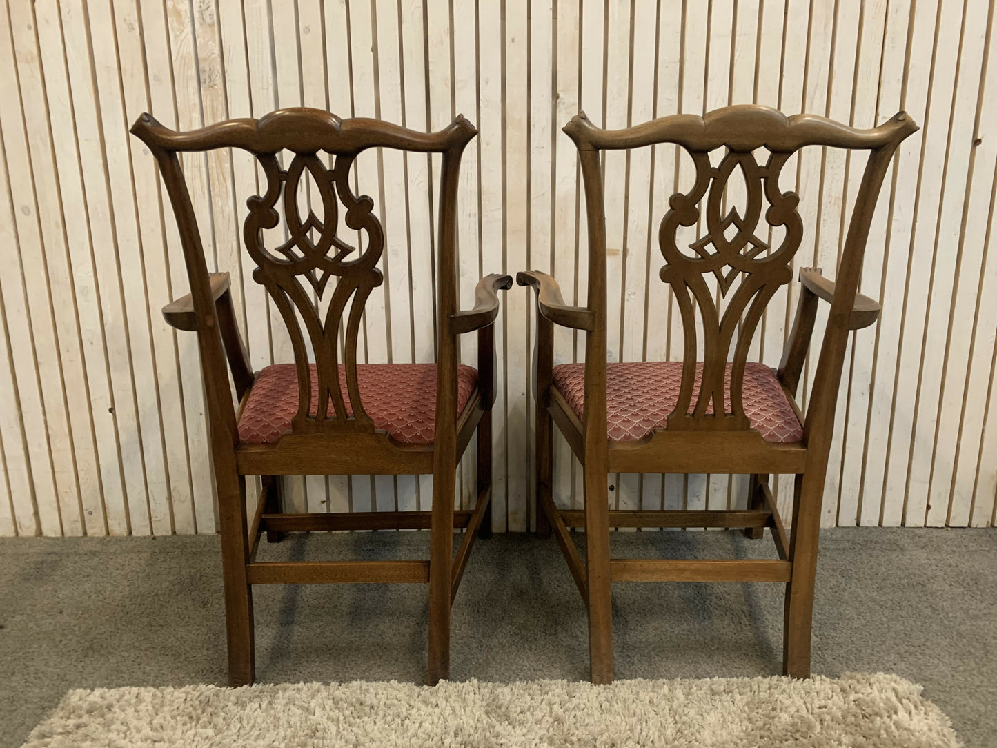6 Mahogany Chippendale Style Dining Chairs with Red Upholstered drop-in seats.