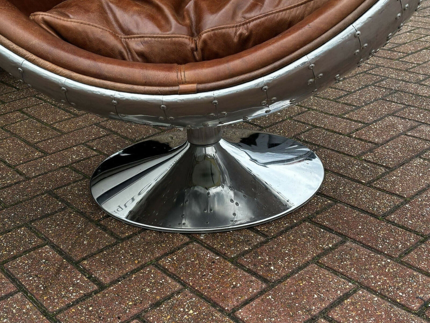 Aviation Swivel Egg Chair With Tan Leather.