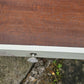 Stag Minstrel beside cabinet with 2 drawers & pullout tray painted in clotted cream