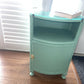 Occasional or bedside table. Green paint. Glass top.