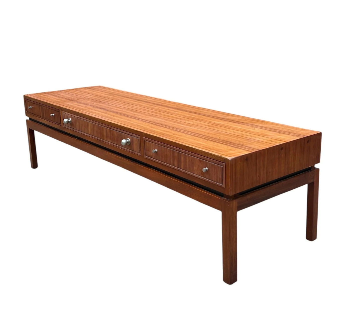 Mid-century long console coffee table by the renowned British makers Greaves and Thomas.