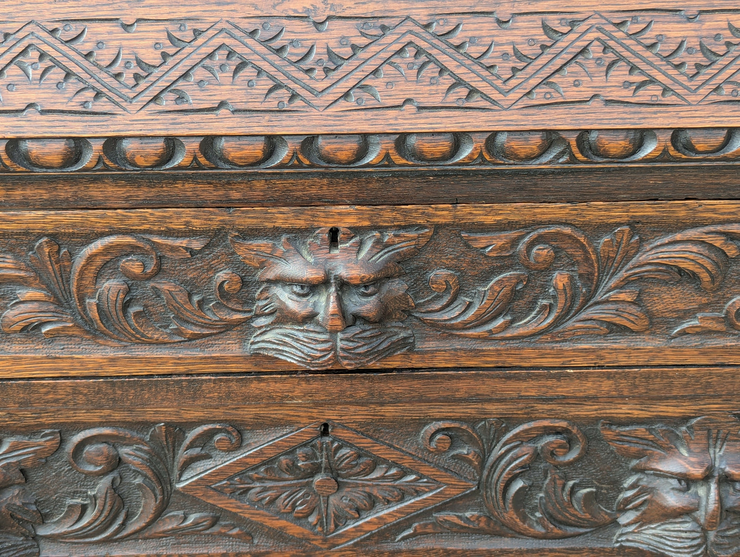Antique Victorian tudor oak hand carved green man bureau dest chest drawers in