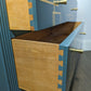 Blue and gold chest of drawers with geometric pattern and original mirrors