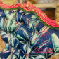 Bold statement accent chair. Pinks,blues and golds