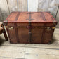 Antique leather trimmed chestnut brown campaign chest