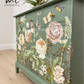 Sage green Stag Minstrel chest of drawers with neutral floral design. 3 over 2. Sideboard, dresser, bedside table