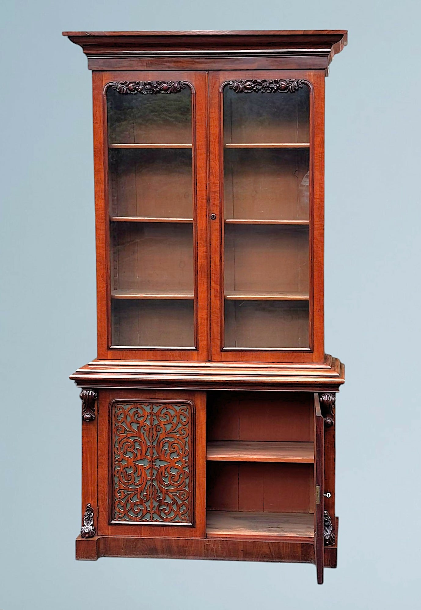A Large Impressive Victorian Figured Mahogany Bookcase