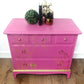 Stag chest of drawers in hot pink and gold
