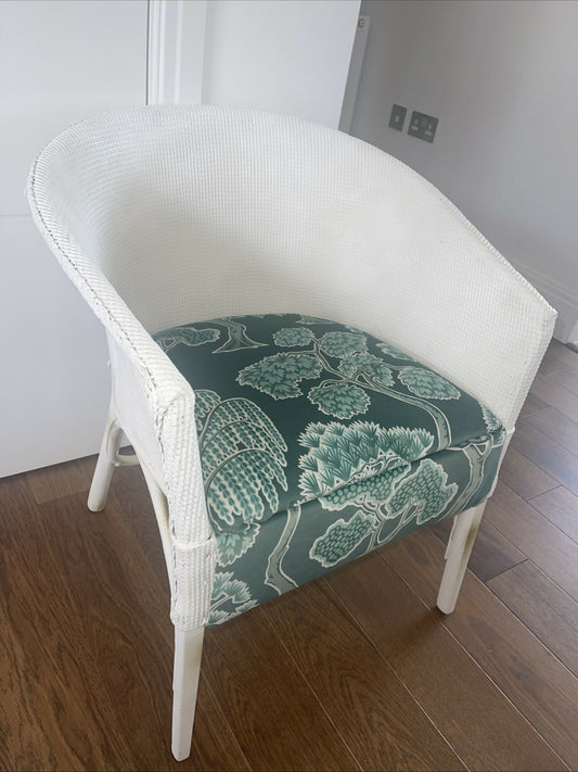white accent chair with velvety tree pattern seat