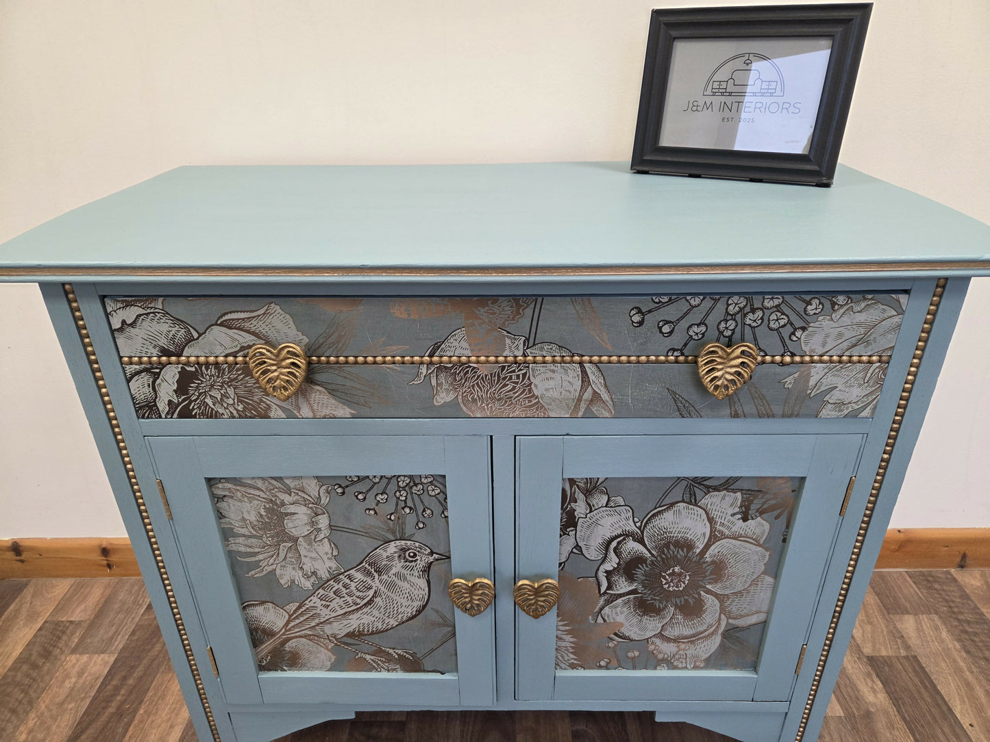 Vintage pale blue and gold drawered cupboard.