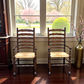 A Pair of Oak Ladder Back Rush Seated Armchairs