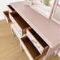 Dusky blush pink Stag Minstrel dressing table set with blossom and butterfly design.