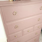 Stag minstrel tallboy chest of drawers in dusky pink