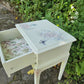 Stag Minstrel 'leggy' beside table with drawer painted in clotted cream