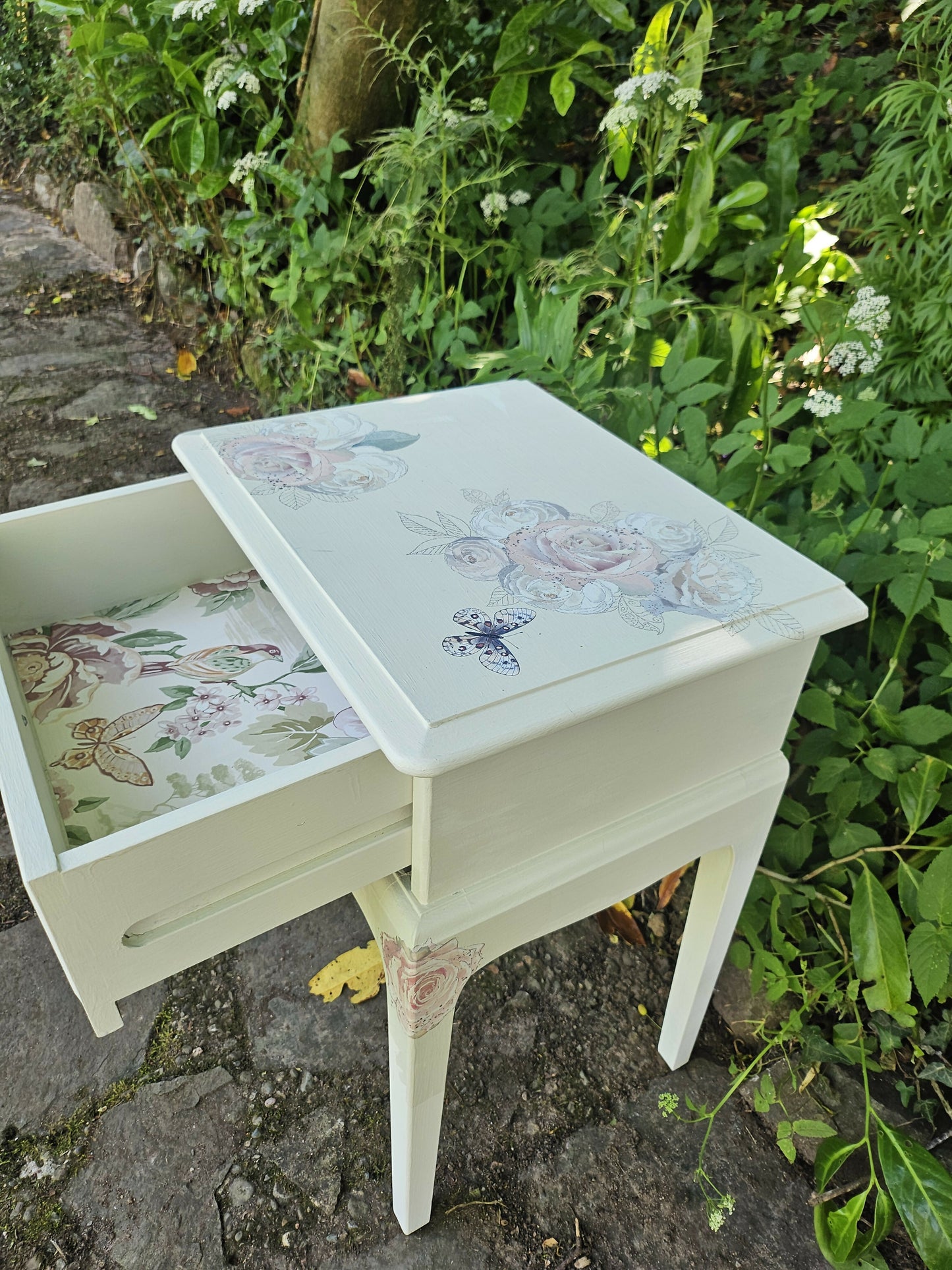 Stag Minstrel 'leggy' beside table with drawer painted in clotted cream