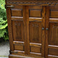 A WOOD BROTHERS OLD CHARM CARVED LIGHT OAK CD STORAGE CABINET / STAND