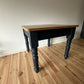 Pine dining table with stripped pine top and blue base