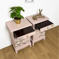 Dusky blush pink Stag Minstrel slim tea tray bedside tables with blossom and butterfly design. Nightstands pale pink