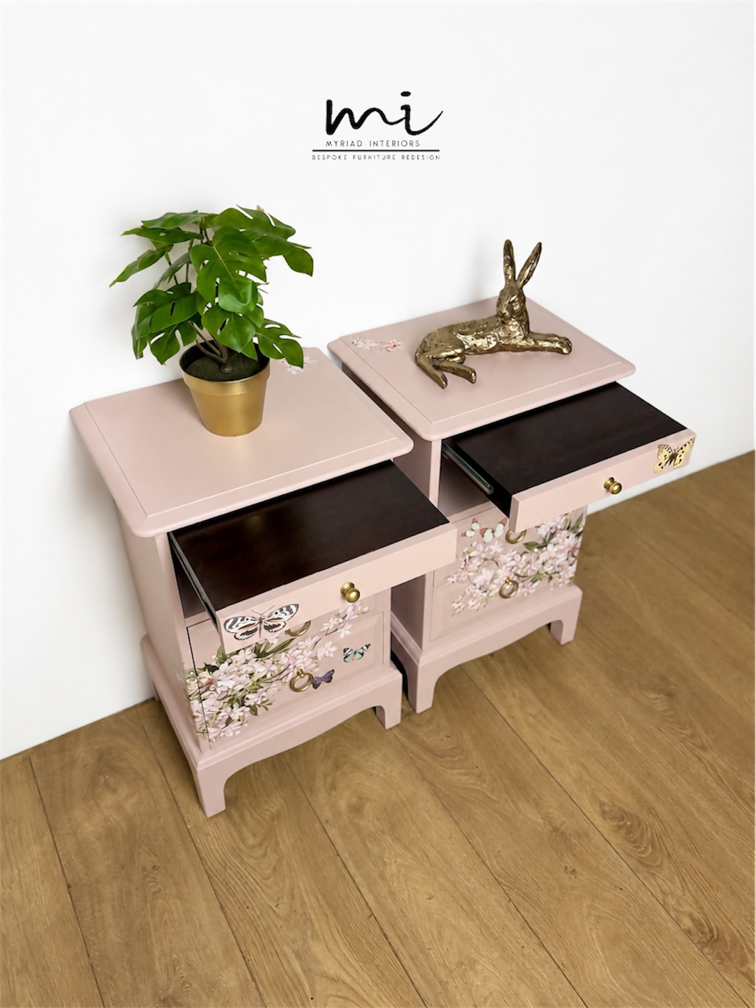 Dusky blush pink Stag Minstrel slim tea tray bedside tables with blossom and butterfly design. Nightstands pale pink