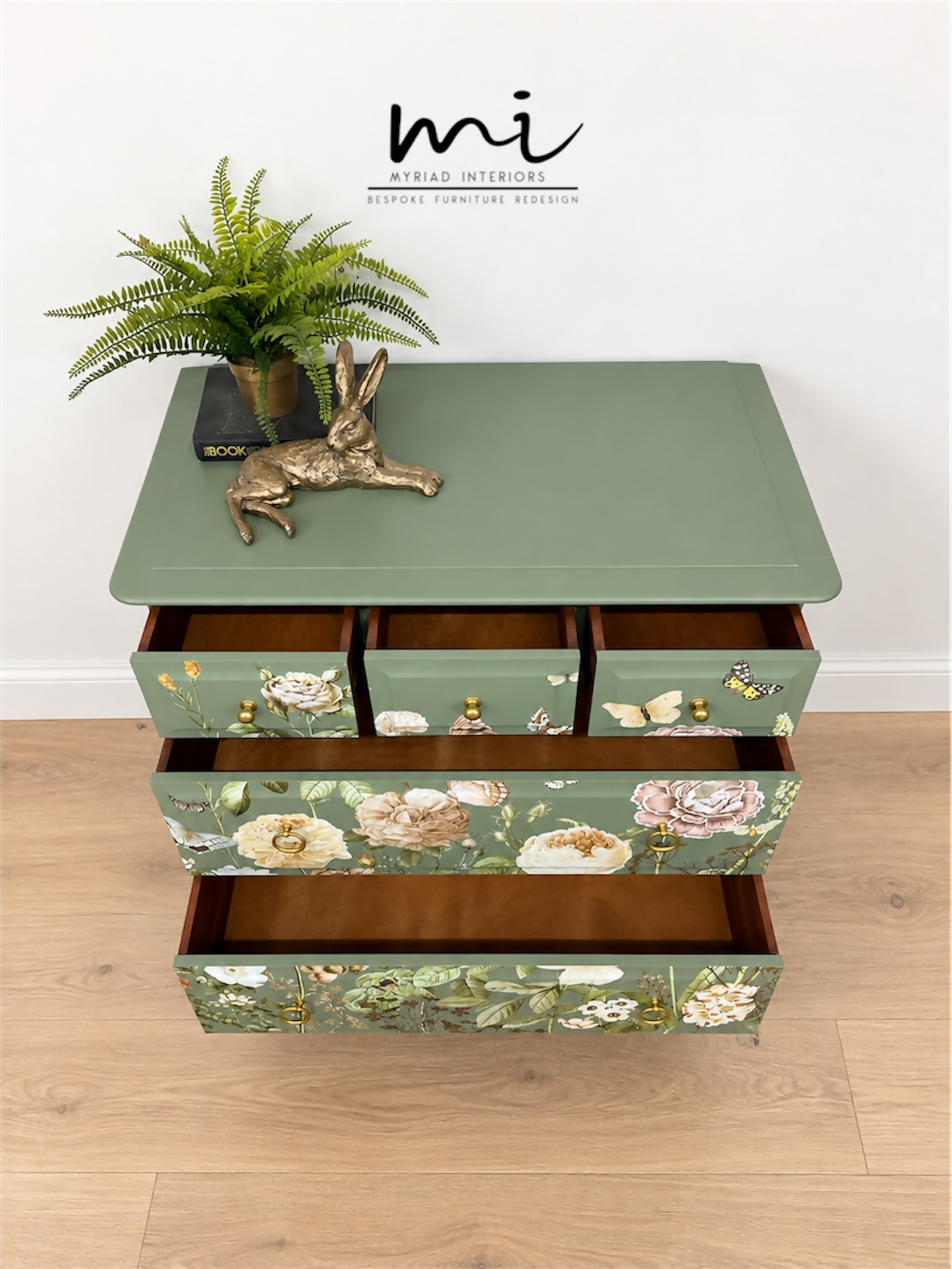 Sage green Stag Minstrel chest of drawers with neutral floral design. 3 over 2. Sideboard, dresser, bedside table