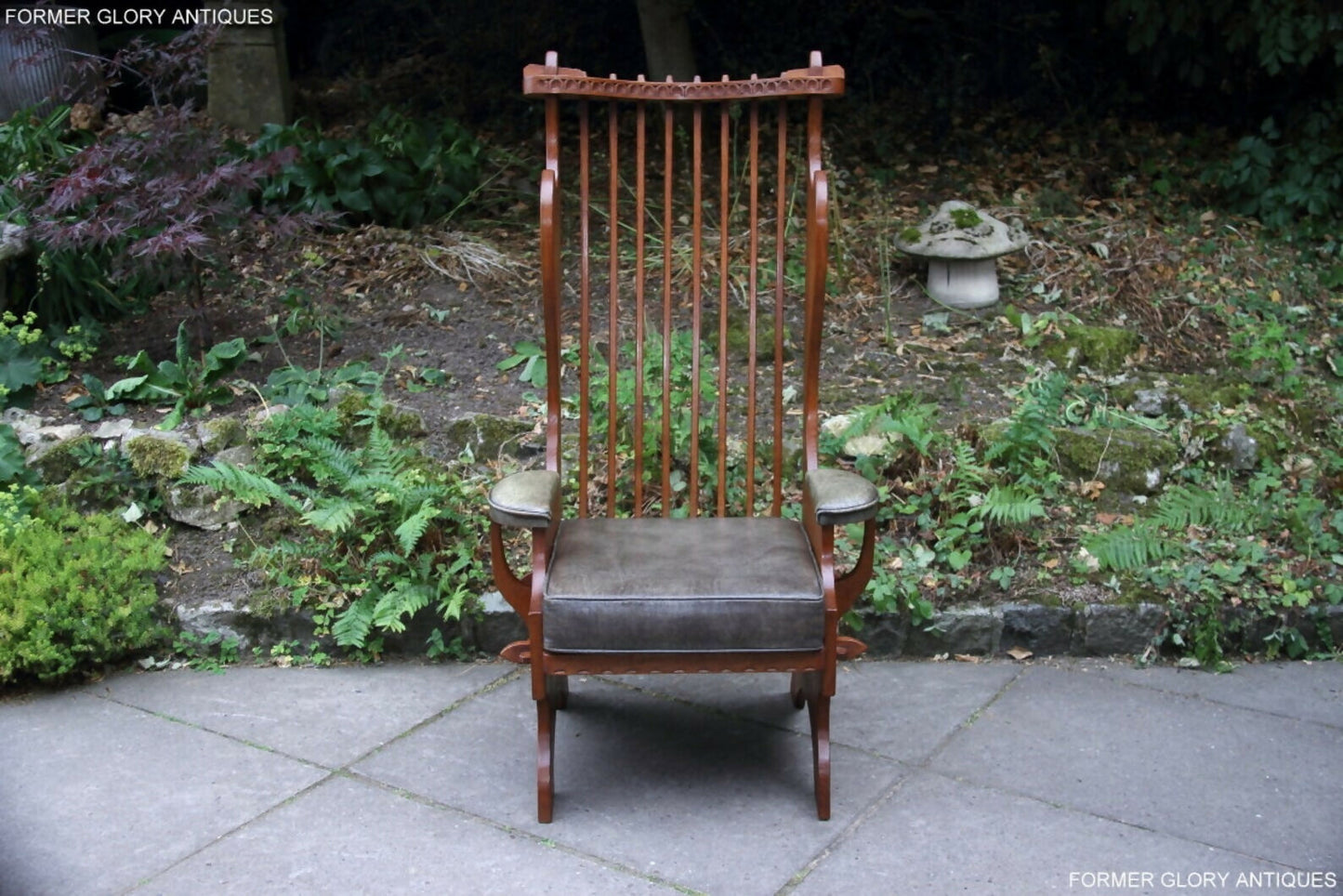 A RUPERT / NIGEL GRIFFITHS CARVED OAK DERBYSHIRE WING BACK LEATHER / ARMCHAIR