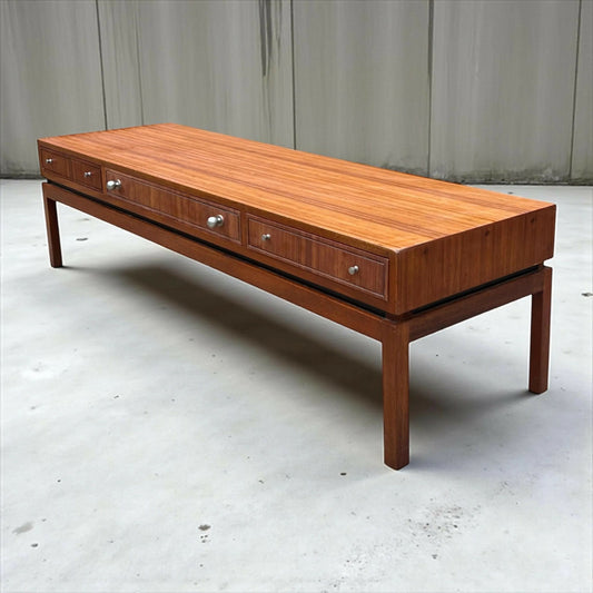 Mid-century long console coffee table by the renowned British makers Greaves and Thomas.